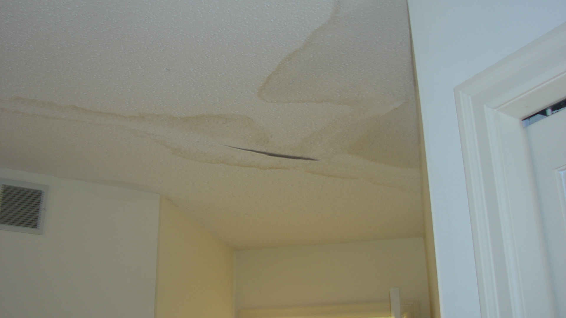 What causes a water leak in the ceiling?