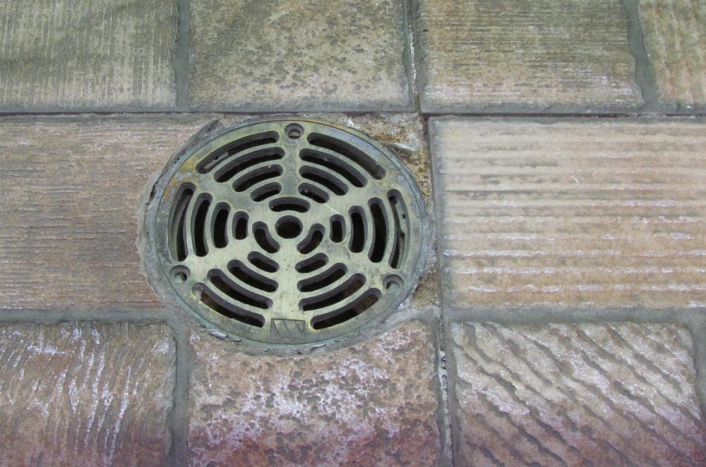 Basement floor drain clogs are extremely common. Learn how to remove a floor drain clog, clean up after a basement drain backup, and prevent clogs in basement drains in the future.