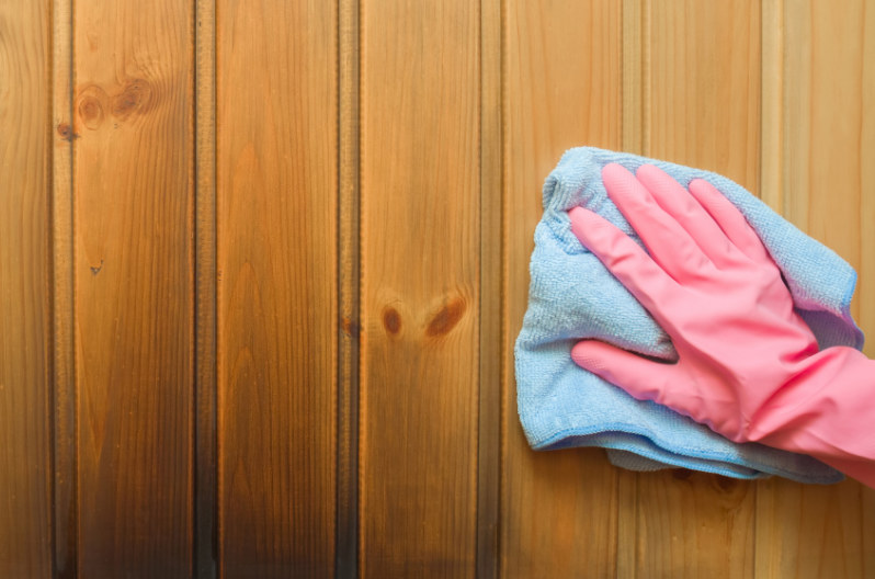 Cleaning soot off walls with a microfiber cloth